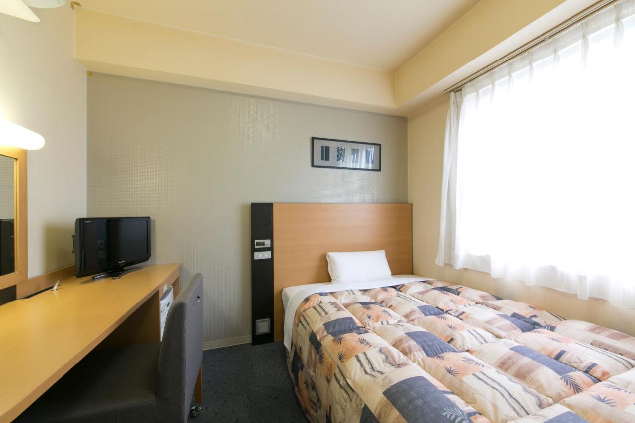 Hotel Econo Taki Luaran gambar