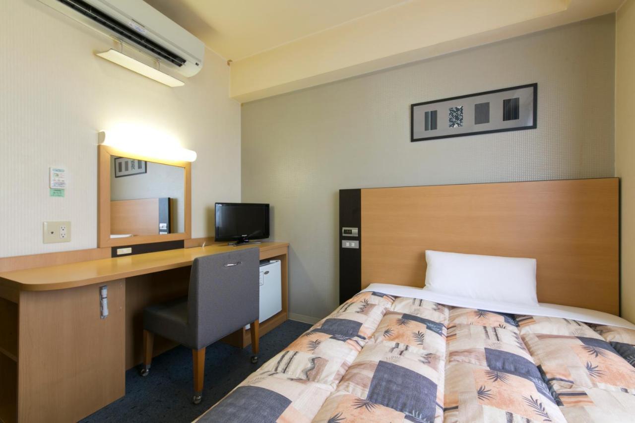 Hotel Econo Taki Luaran gambar