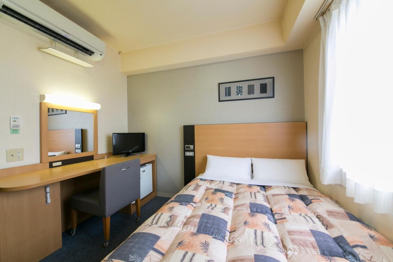 Hotel Econo Taki Luaran gambar