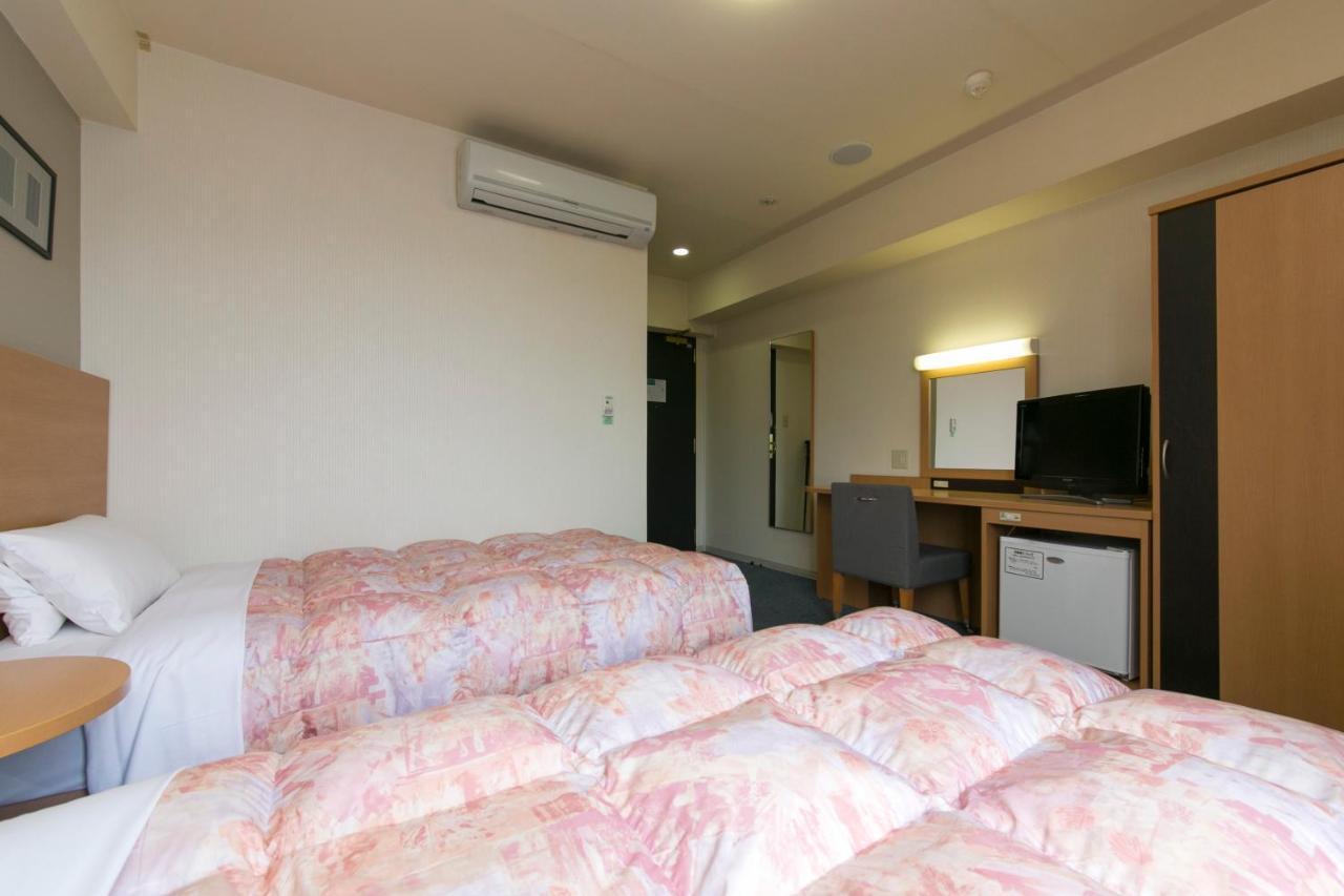 Hotel Econo Taki Luaran gambar