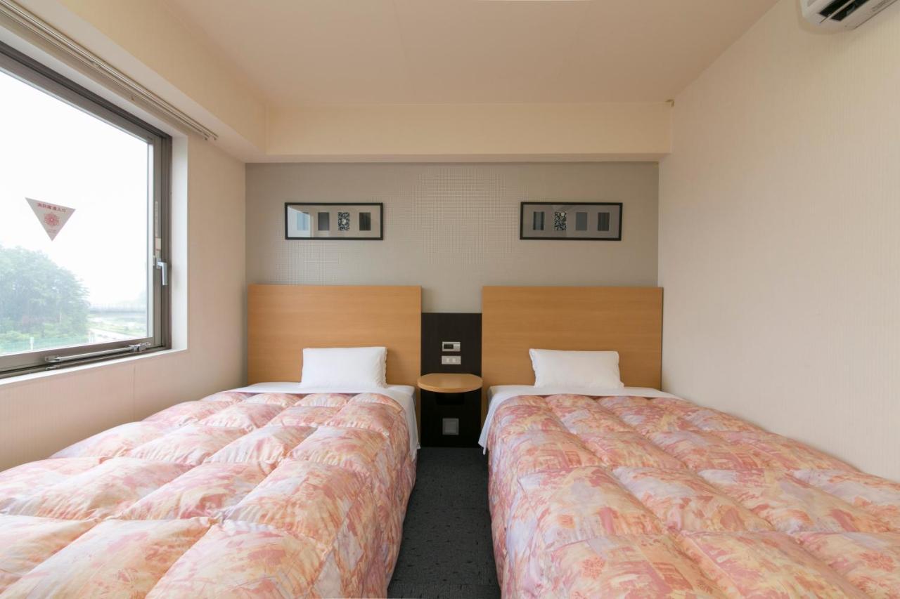 Hotel Econo Taki Luaran gambar